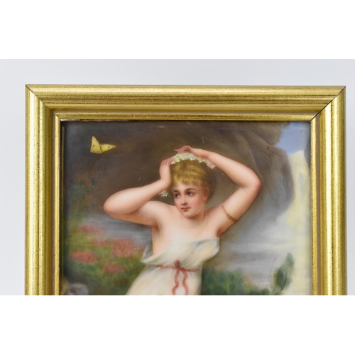 217 - A late 19th/early 20th century KPM style painted porcelain plaque depicting a maiden in a white dres... 