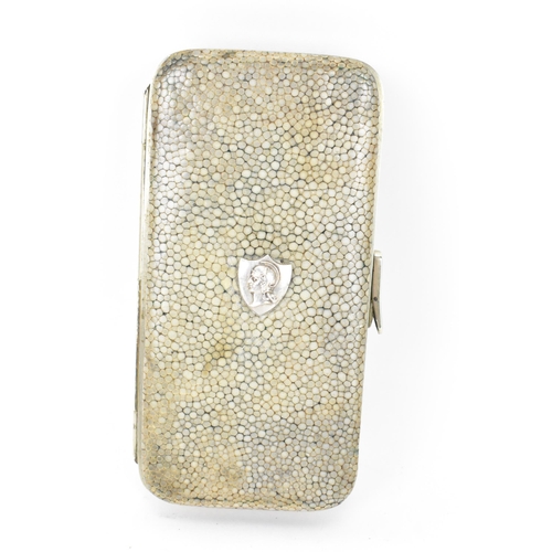 221 - An early 20th century shagreen cigarette case having a gilded interior, 8.5cm x 6.5cm, together with... 