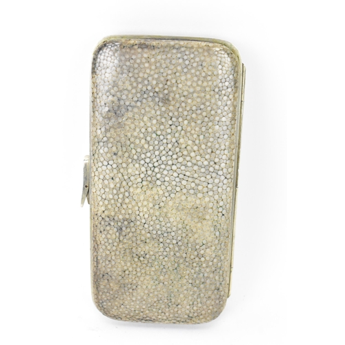 221 - An early 20th century shagreen cigarette case having a gilded interior, 8.5cm x 6.5cm, together with... 