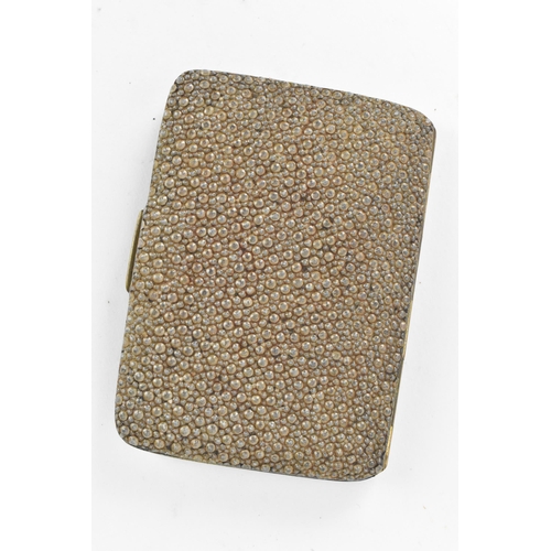 221 - An early 20th century shagreen cigarette case having a gilded interior, 8.5cm x 6.5cm, together with... 