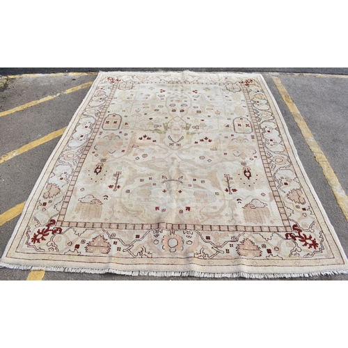 226 - A hand woven English design Zieglar Mahal rug, on a beige ground with repeating floral motifs, multi... 