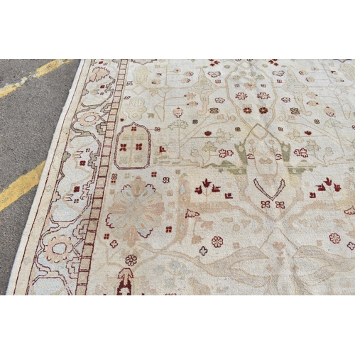 226 - A hand woven English design Zieglar Mahal rug, on a beige ground with repeating floral motifs, multi... 