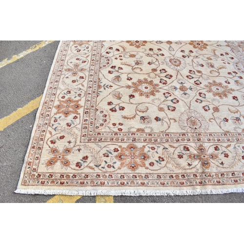 227 - A hand woven English design Zieglar Mahal rug, on a beige ground with repeating floral motifs, multi... 