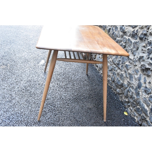 229 - A 1960s Ercol blonde elm and beech breakfast table, model 395, having a rectangular top with a spind... 