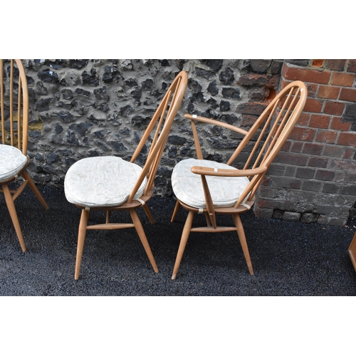 230 - A set of four 1960s Ercol chairs blonde elm and beech 'Quaker' dining chairs, two being carvers, hav... 