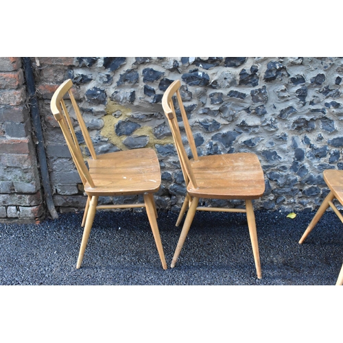 231 - A set of four Ercol blonde elm and beech kitchen dining chairs, model 391, having spindle stick back... 