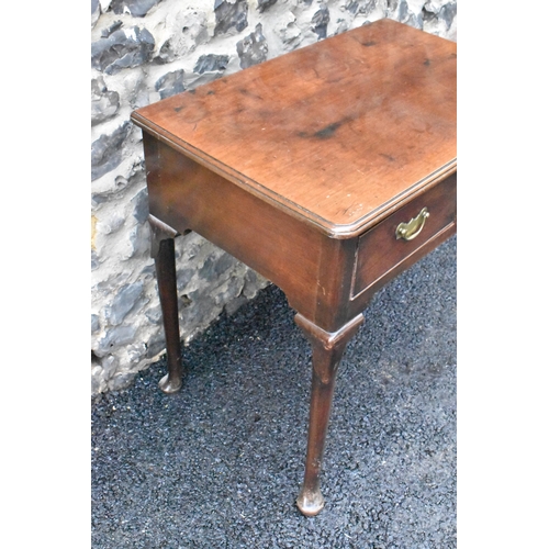 232 - A George II mahogany lowboy, having a rectangular top with rounded corners, two drawers with brass d... 