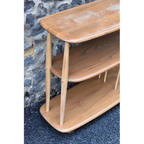 233 - A mid 20th century Ercol elm and beech Baby Giraffe three tier trolley, model 361, Windsor range, in... 