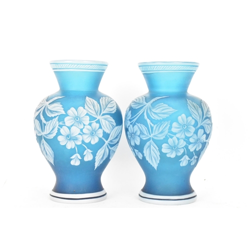 235 - A pair of late 19th Century Stourbridge cameo glass vase, attributed to Thomas Webb & Co, the transl... 