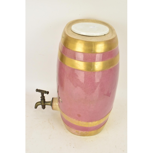 236 - A Victorian ceramic cloves barrel, of oval shape and decorated with a pink ground with gilt bands an... 