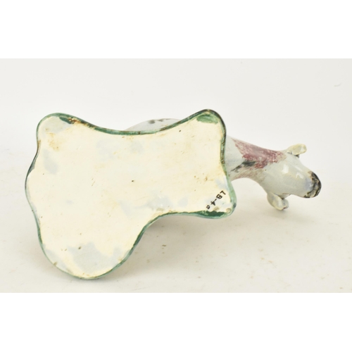 248 - Two early 19th century pearlware pink and green sponge decorated cow creamers with milkmaids, possib... 