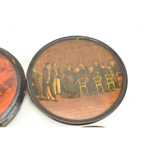 250 - Two early 19th century papier mache snuff boxes to include one with applied print to the lid with a ... 