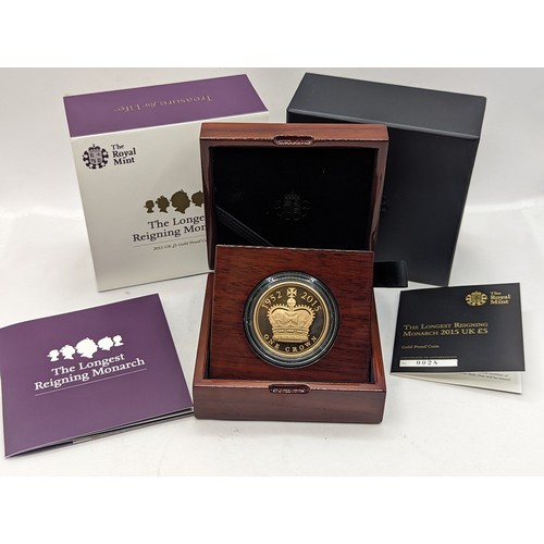 United Kingdom - Elizabeth II (1952-2022), Gold Proof Five Pounds, Royal Mint commemorative 'The Longest Reigning Monarch' Limited Edition Presentation 28/1000, Celebrating HM Queen Elizabeth II becoming the longest serving monarch, surpassing Queen Victoria's reign of 63 years and 216 days, in the original box as issued by the Mint and the certificate of authenticity