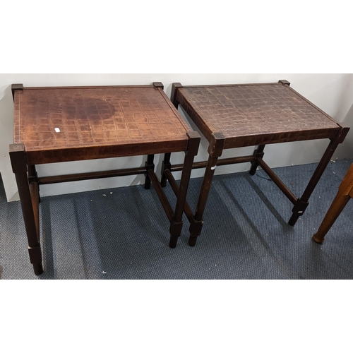 454 - A pair of modern occasional tables having brown leather tops with mahogany finished turned legs, 60.... 