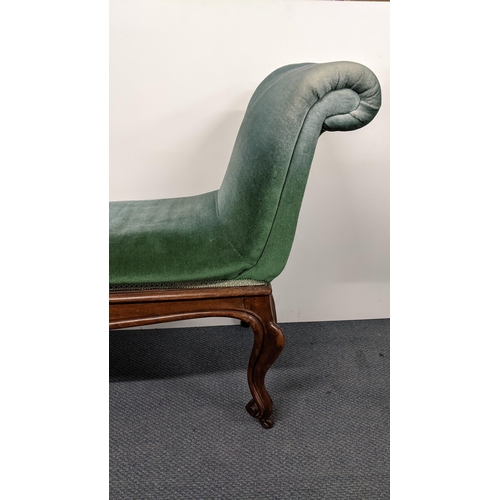 190 - A 19th century French walnut window seat having padded scroll ends, cabriole legs with carved scroll... 