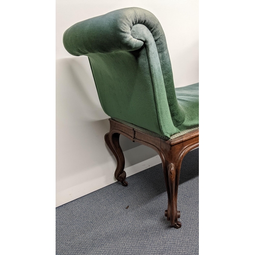 190 - A 19th century French walnut window seat having padded scroll ends, cabriole legs with carved scroll... 