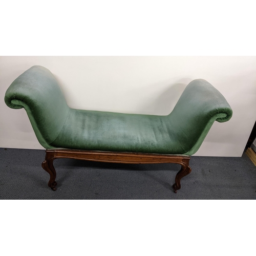 190 - A 19th century French walnut window seat having padded scroll ends, cabriole legs with carved scroll... 