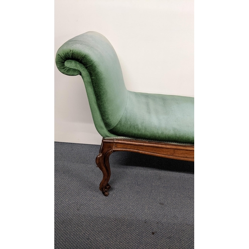 190 - A 19th century French walnut window seat having padded scroll ends, cabriole legs with carved scroll... 