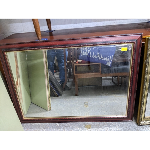 418 - Two contemporary wall mirrors, one gilt frame with rectangular glass plate, the other wood framed wi... 