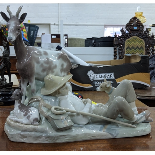 427 - A Lladro figure of boy asleep with two dogs and a goat, 35cm h, Location:2:1