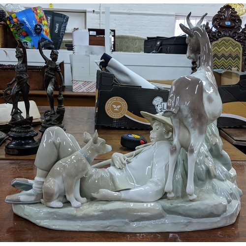 427 - A Lladro figure of boy asleep with two dogs and a goat, 35cm h, Location:2:1