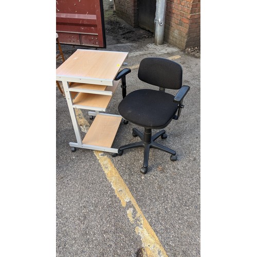 445 - A modern light oak bureau with a fall flap over two drawers, raised on straight legs, 101h x 76w, a ... 