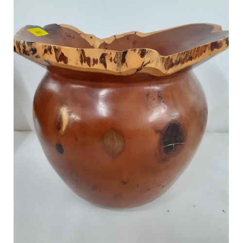 433 - A Terry Harvey hand turned yew planter dated 1996 with label and carved insignia to the base, 27cm H... 