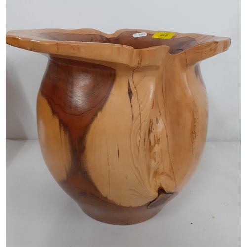 434 - A Terry Harvey hand turned yew planter, label and carved insignia to base, 28cm High x 15cm internal... 