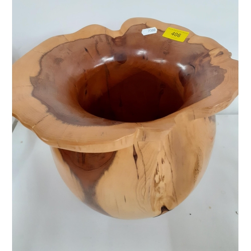 434 - A Terry Harvey hand turned yew planter, label and carved insignia to base, 28cm High x 15cm internal... 