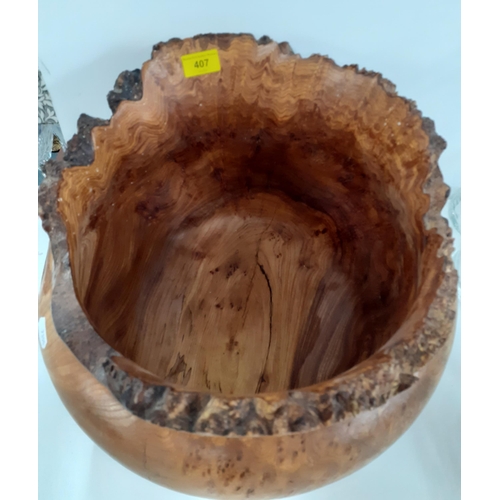 435 - A Terry Harvey hand turned burr wych elm planter, label and carved insignia to base, 27cm High x 29c... 