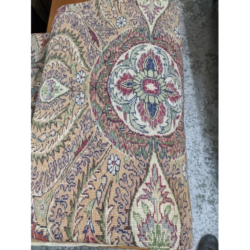 463 - A Turkish hand woven woollen carpet, central floral medallion surrounded by all over floral designs,... 