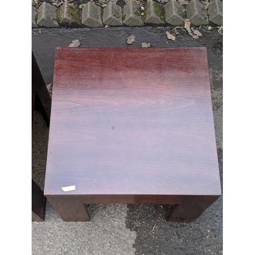 509 - A modern metal framed table with a glass top and a matching lamp table, a red modernist style lamp t... 