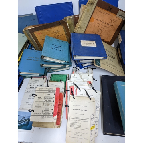 380 - A large quantity of Royal Air Force manuals for flying and air navigation, blank pilot's log book an... 