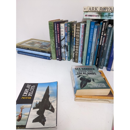 381 - A quantity of books on aviation and aircraft to include The Concorde Story, along with three books o... 