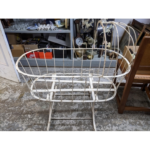 385 - An early 20th century white painted wrought iron cot Location: