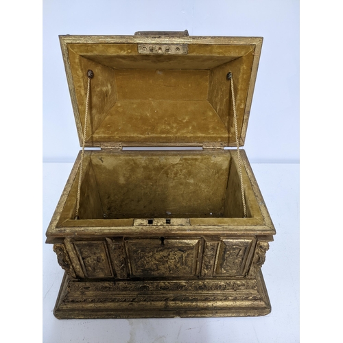 388 - A late Victorian gilt wood jewellery casket, decorated with panels in relief of figures in various s... 