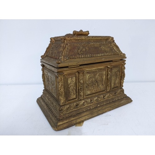 388 - A late Victorian gilt wood jewellery casket, decorated with panels in relief of figures in various s... 