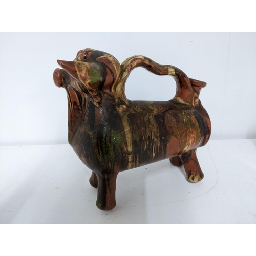 459 - A mixed lot to include a Spanish pottery jug in the form of a bull, a Bohemian glass tankard with pe... 