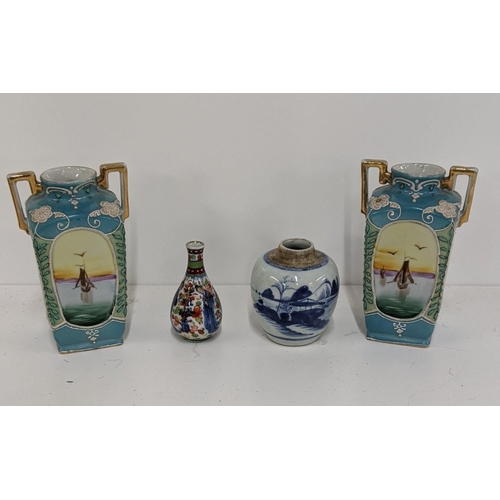 491 - Oriental ceramics to include a Chinese blue and white ginger jar, a clobbered vase and a pair of Nor... 