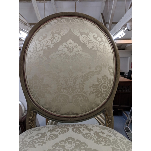 499 - A pair of modern hall chairs with upholstered back and overstuffed seats in a green floral fabric ra... 