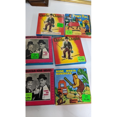 500 - A mixed lot to include Charlie Chaplin 8mm movie film reel and others, with a vintage Cabbage Patch ... 