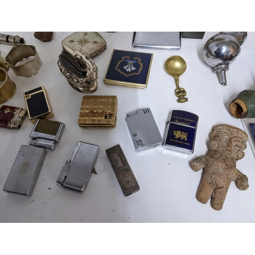 502 - A mixed lot to include two silver photograph frames, a John Sterling lighter and others, celluloid l... 