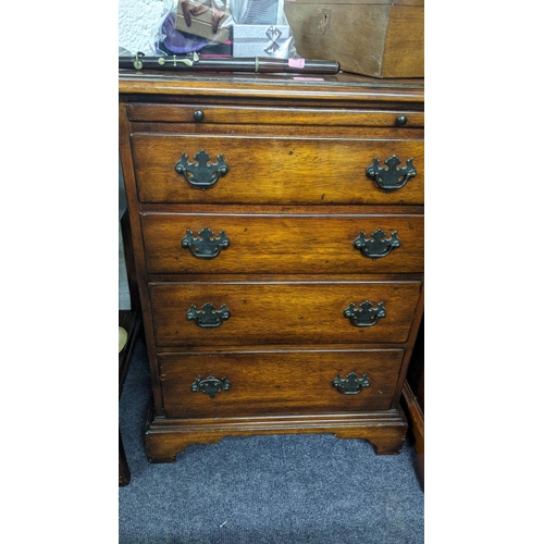 260 - A reproduction Georgian inspired gentleman's dressing chest together with a bedside chest
Location: ... 