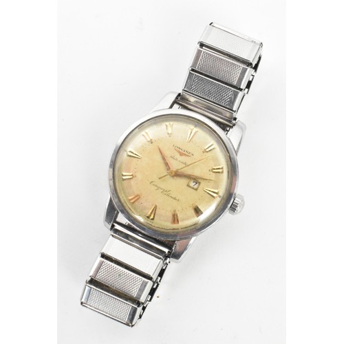 91 - A Longines Conquest Calendar, automatic, gents, stainless steel wristwatch, the dial having gilt bat... 