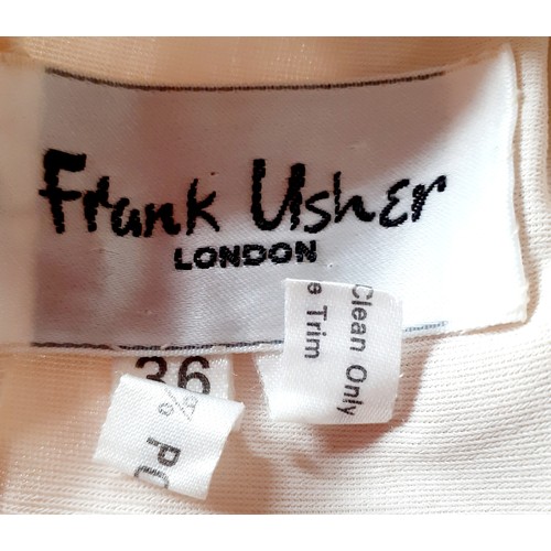 108 - Frank Usher-A 1970's cream chiffon full length evening gown having tiered waterfall sleeves, 32/34