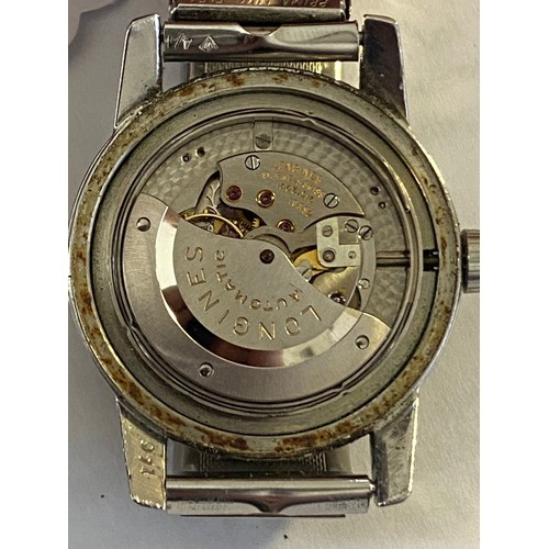 91 - A Longines Conquest Calendar, automatic, gents, stainless steel wristwatch, the dial having gilt bat... 