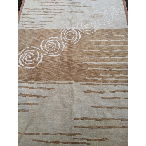 112 - A contemporary cream and beige rug with swirl and line decoration 242cm x 175cm Location:A3B
