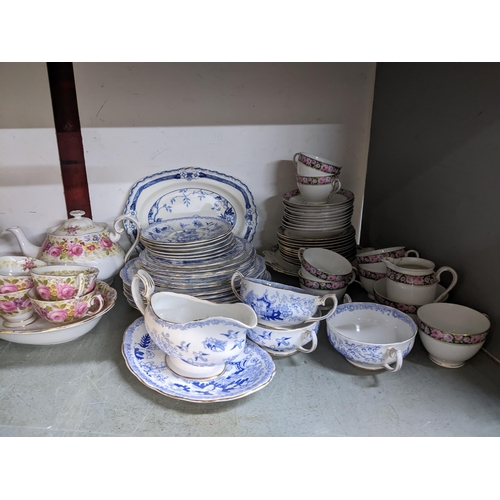 74 - A selection of Royal Albert and other table wares to include a Serena patter part dinner and breakfa... 