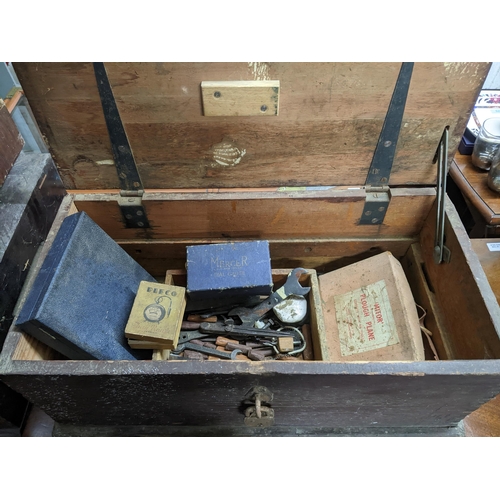 79 - A mixed lot of tools contained mainly in three wooden tool boxes to include a Mercer dial gauge, a M... 