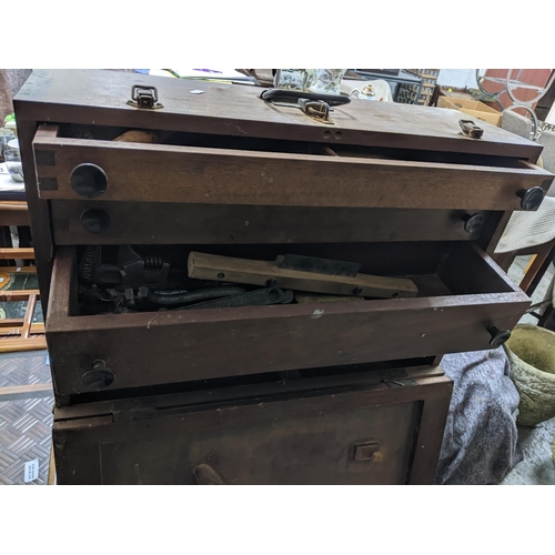 79 - A mixed lot of tools contained mainly in three wooden tool boxes to include a Mercer dial gauge, a M... 
